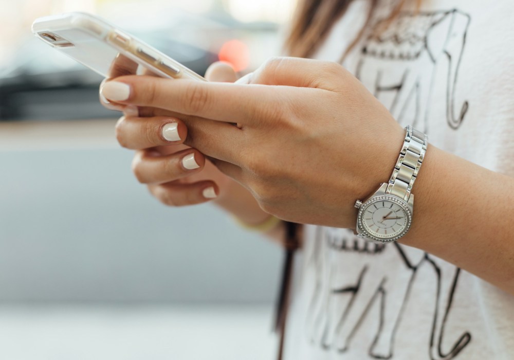 woman holding mobile phone